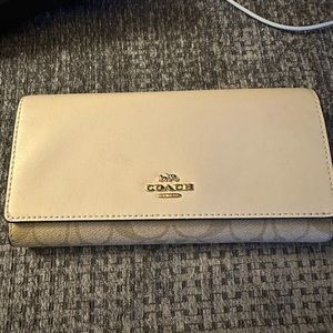Coach Large Slim Trifold Wallet in Signature Canvas.